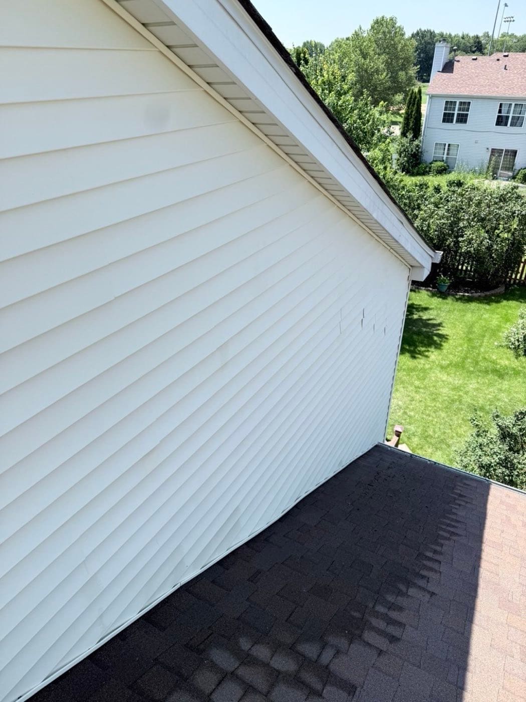 Clean white vinyl siding after a power wash